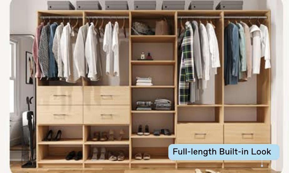 Alto closet system in oak finish with full-length built-in look, hanging rods, drawers, and shoe shelving